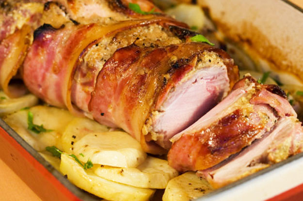 Bacon Wrapped Roasted Pork Loin on Potatoes and Onions